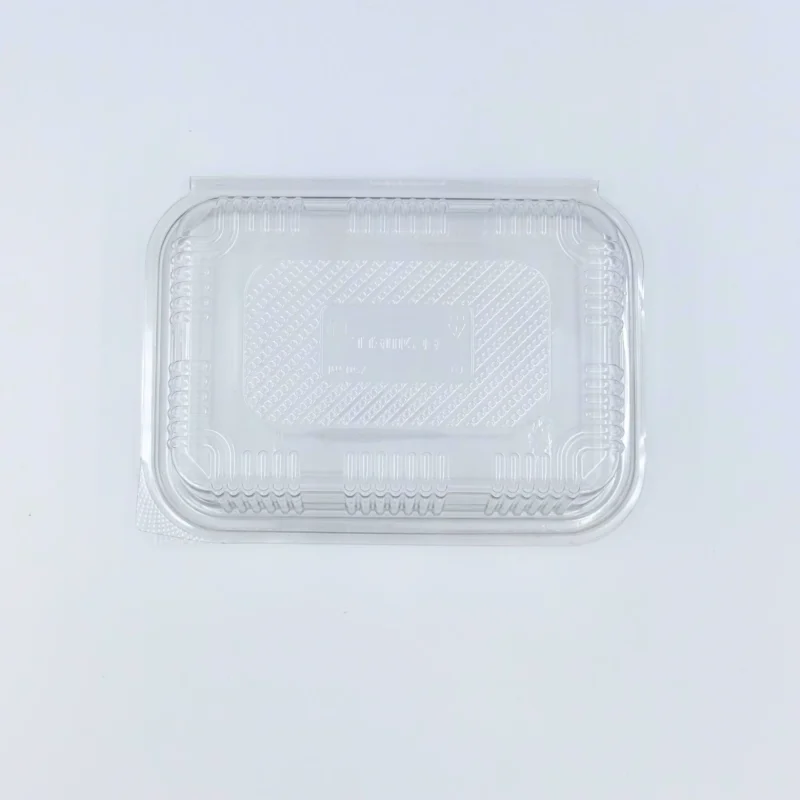 1000ml 5 Clear transparent plastic clamshell packaging tray photographed from above, empty and open edge visible