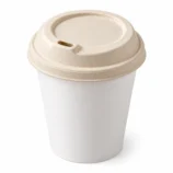 Bagasse cup lid 80 mm sipper lid on an 8 oz paper cup